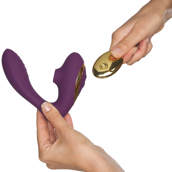 Tracy's Dog Pro 2 Klitorisstimulator Vibrator Produktbilde med hånd 51