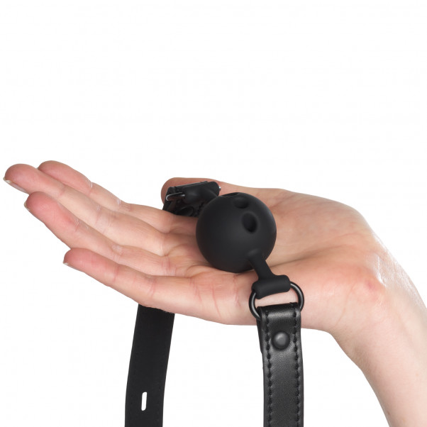 Sportsheets Saffron Ball Gag med Pustehull Produktbilde med hånd 50